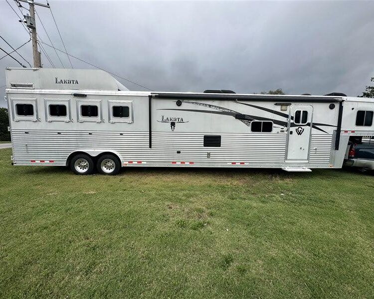2014 Lakota Bighorn 8416, Generator, Couch, Dinette 17’ Shortwall, 4 Horse Trailer, 12' Slide.